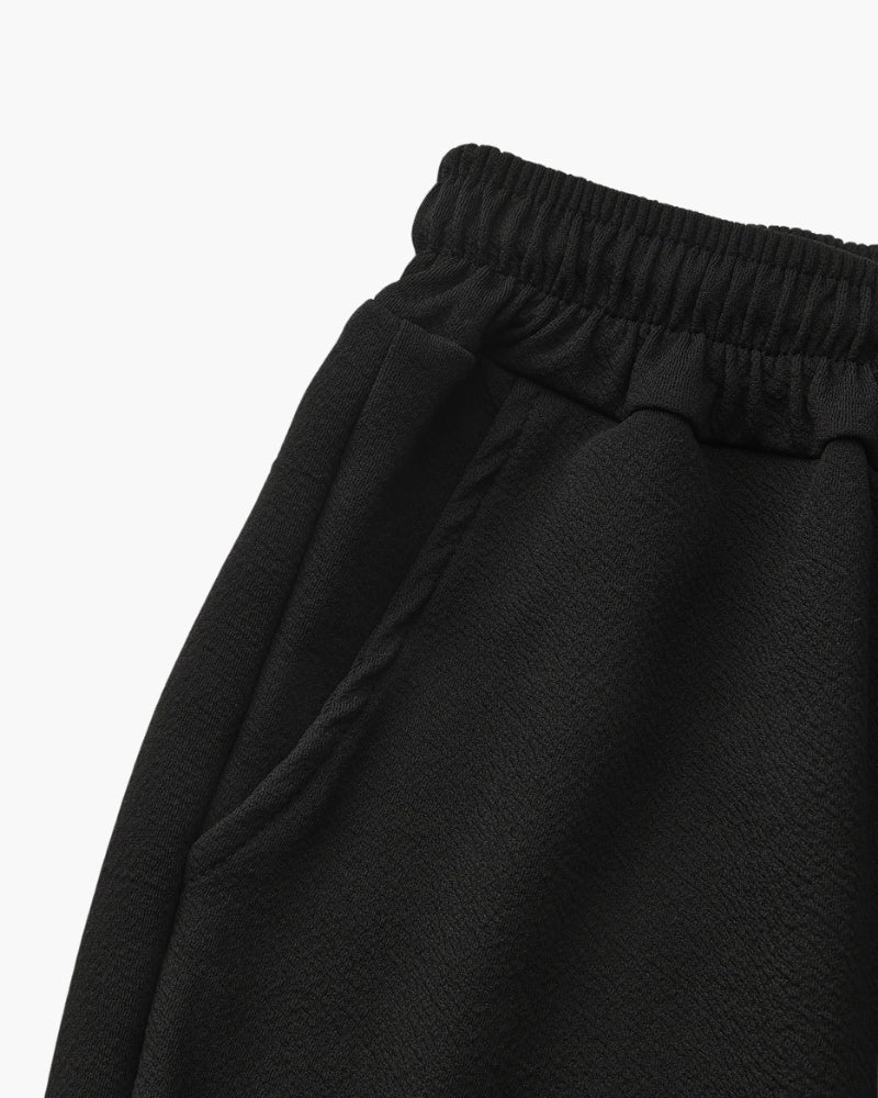 Completo polo e pantaloni in cotone