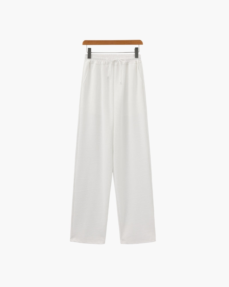 Completo polo e pantaloni in cotone