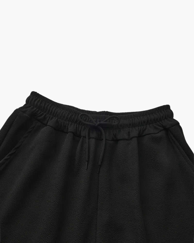 Completo polo e pantaloni in cotone