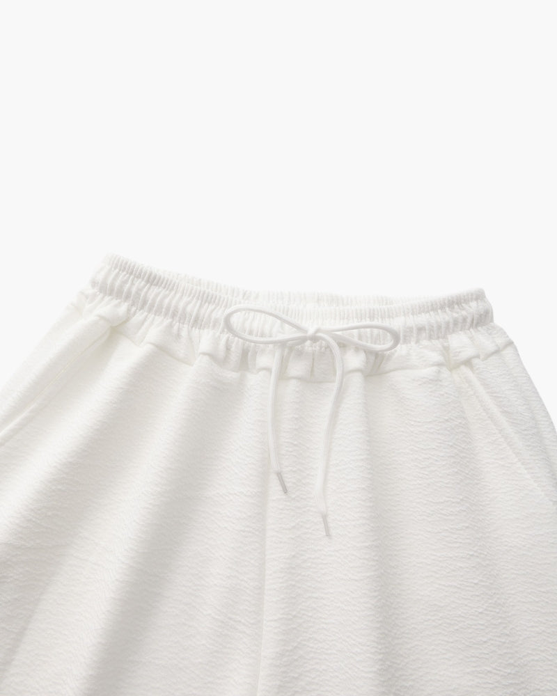 Completo polo e pantaloni in cotone