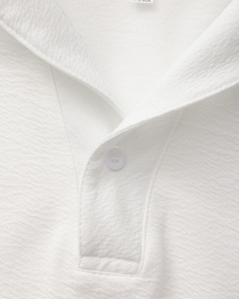 Completo polo e pantaloni in cotone