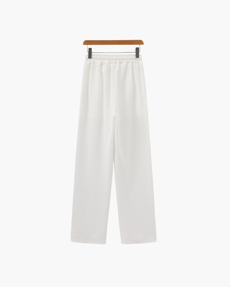 Completo polo e pantaloni in cotone